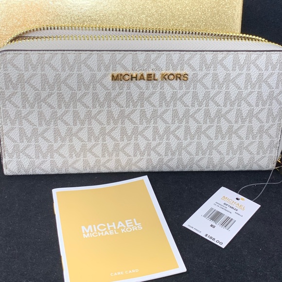 Michael Kors Handbags - Michael Kors NEW large zip around leather wallet